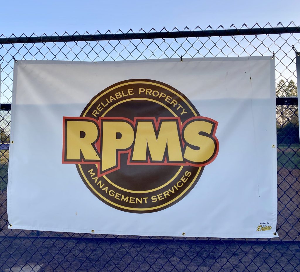 Sponsor banner for RPMS at ENLL field.